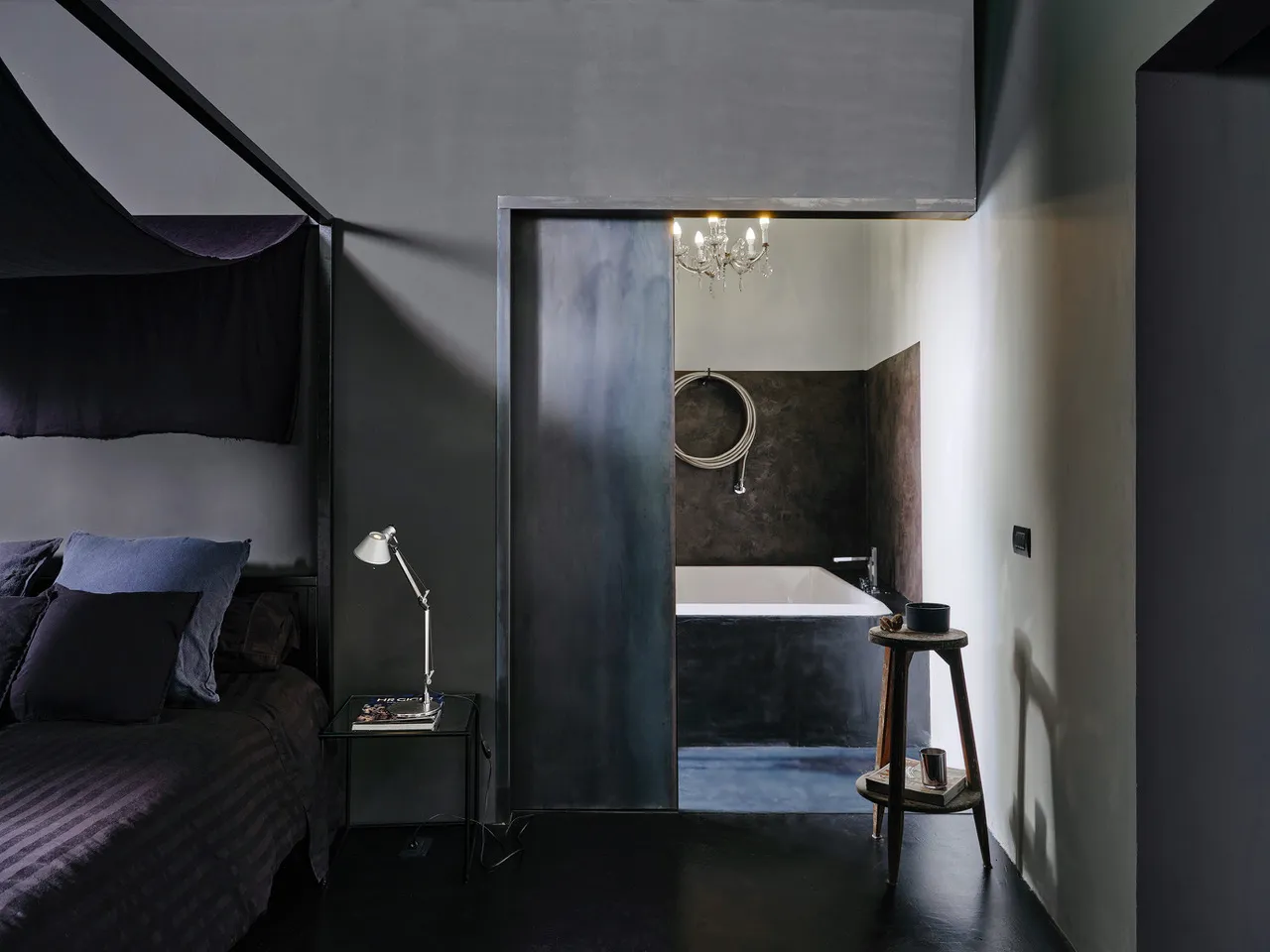 The bath alcove opening onto the bedroom